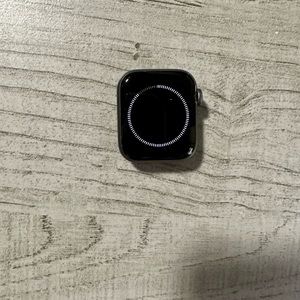 Apple Watch-Series 4, Charger, & 1 New Off-Brand Black Wristband